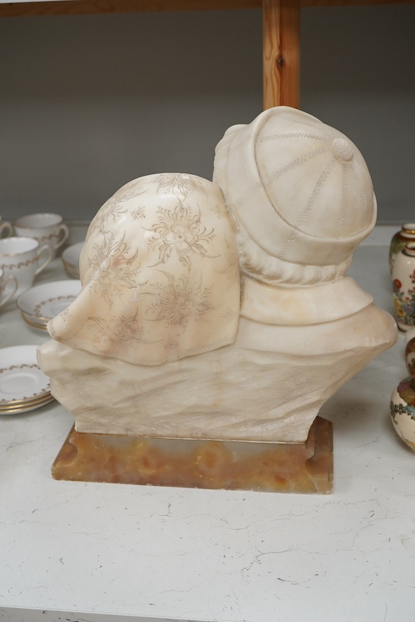 Eugenio Battiglia, (Florentine, fl. late 19th century), a carved alabaster bust of an elderly couple, 36cm high